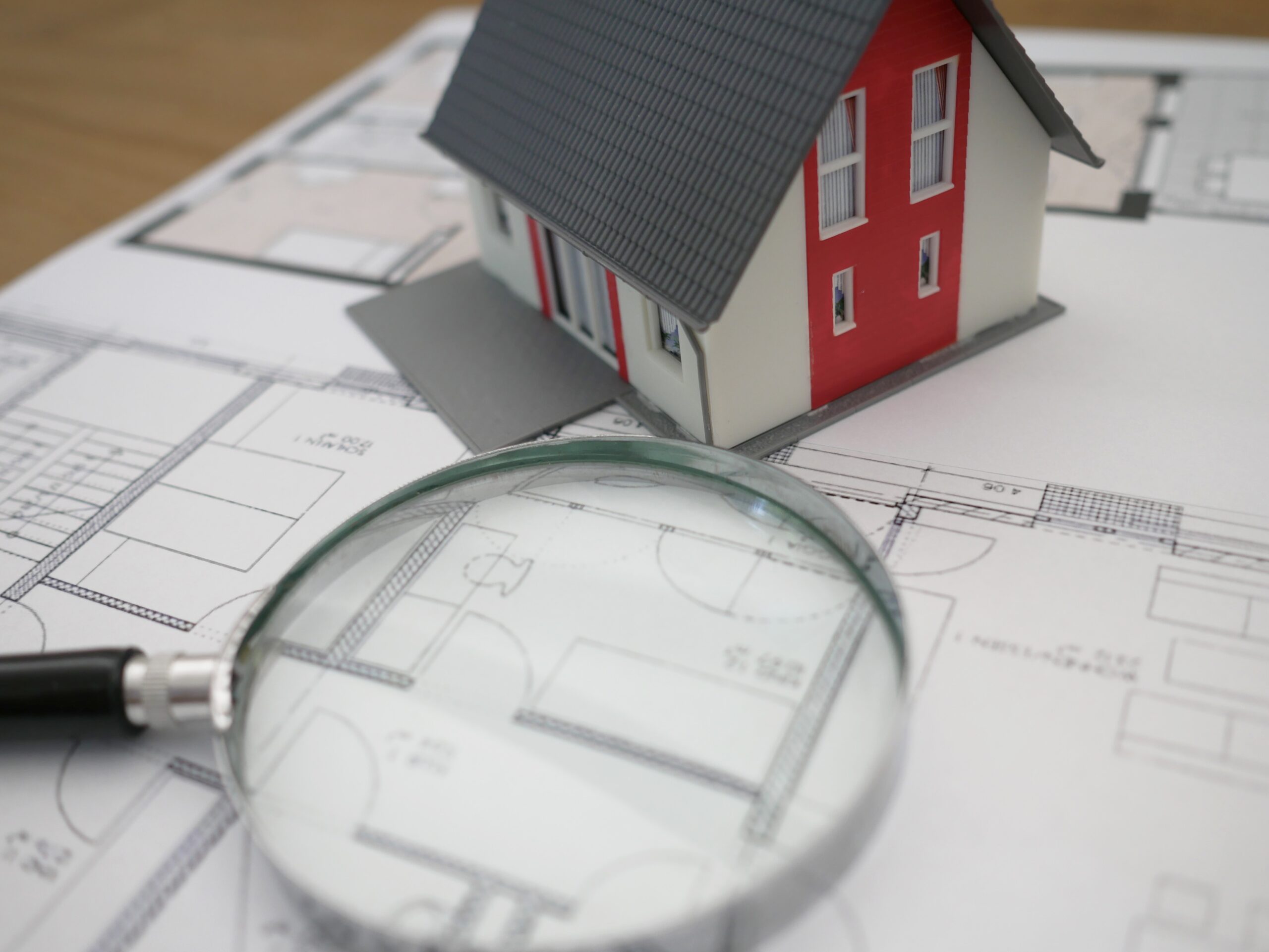 house-plans-and-a-magnifying-glass