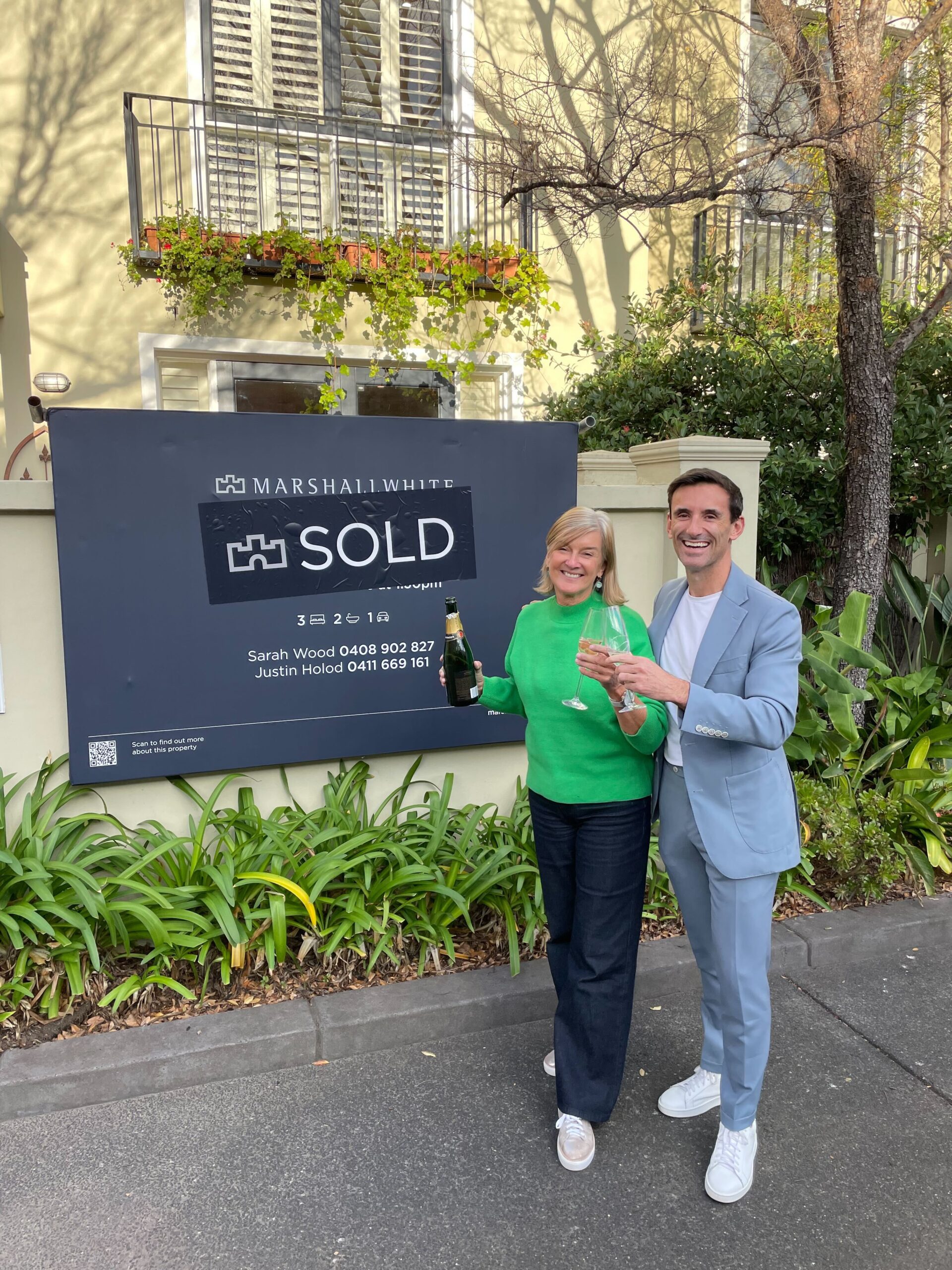 happy client with her buyer agent in Melbourne