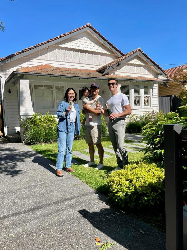 Buyer advocate celebrating with his clients in Malvern East Melbourne