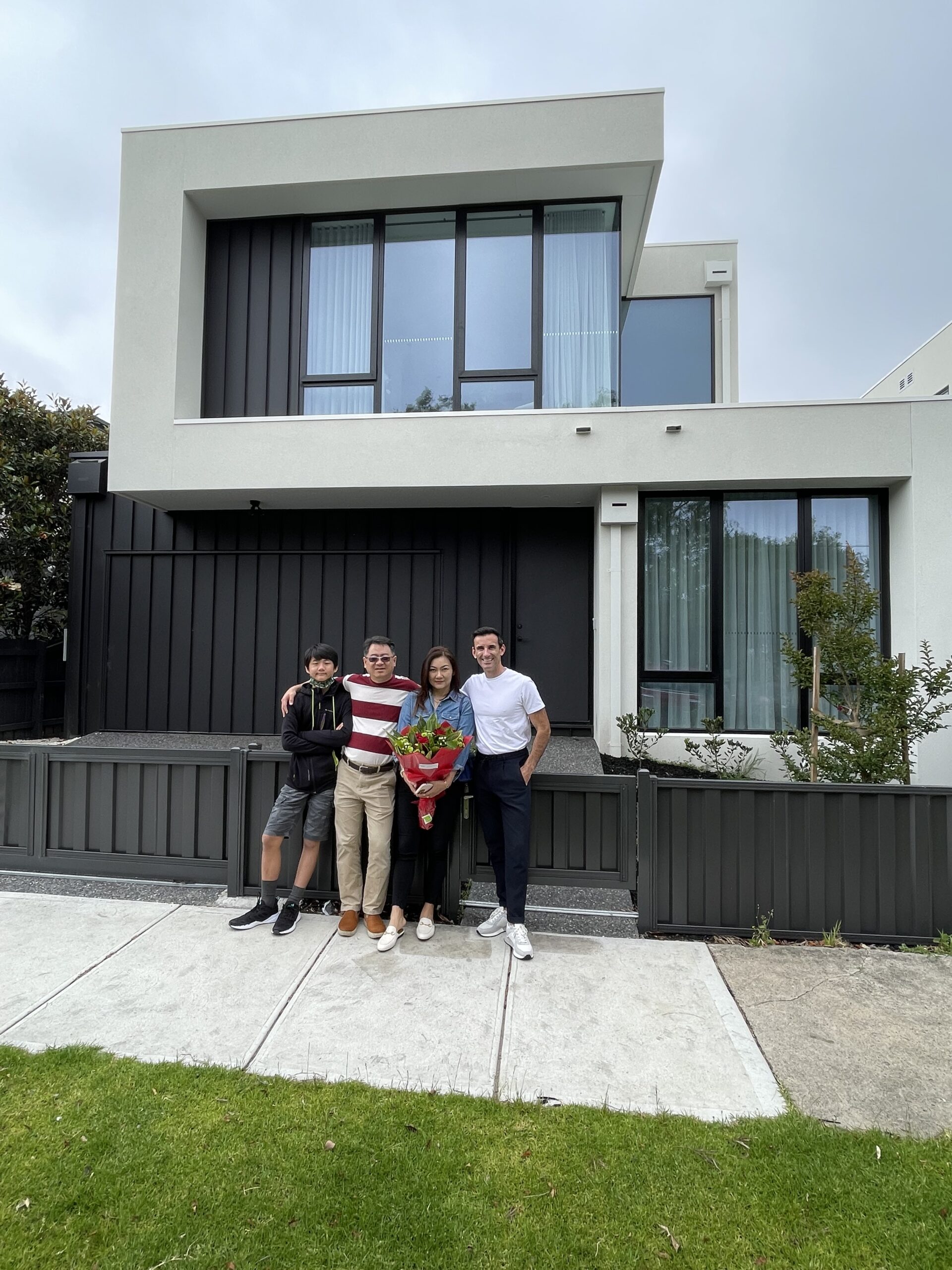 Taiwan-based clients in front of their new home in Melbourne