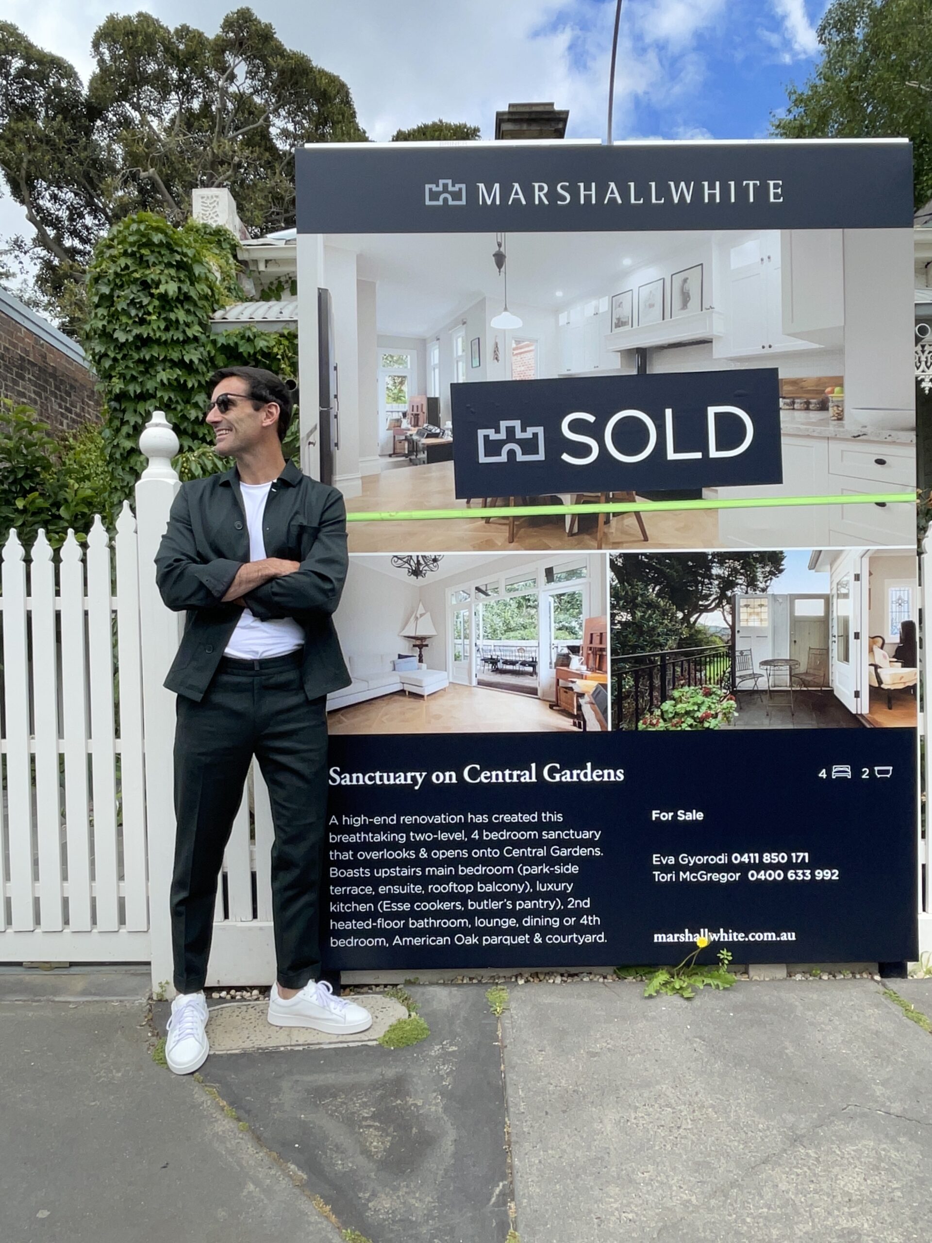 A buyer advocate from Melbourne standing in front of a house he bought under auction
