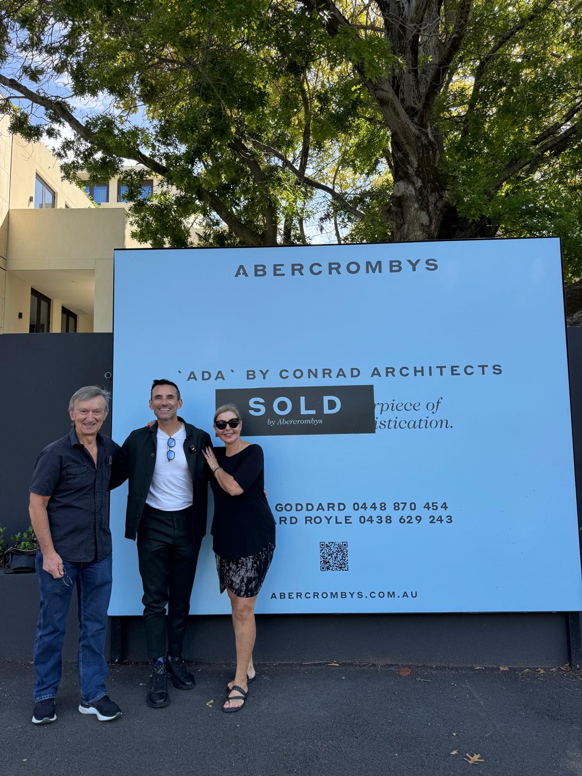 Three people in front on a property a buyer agent in Melbourne bought for our clients in Toorak