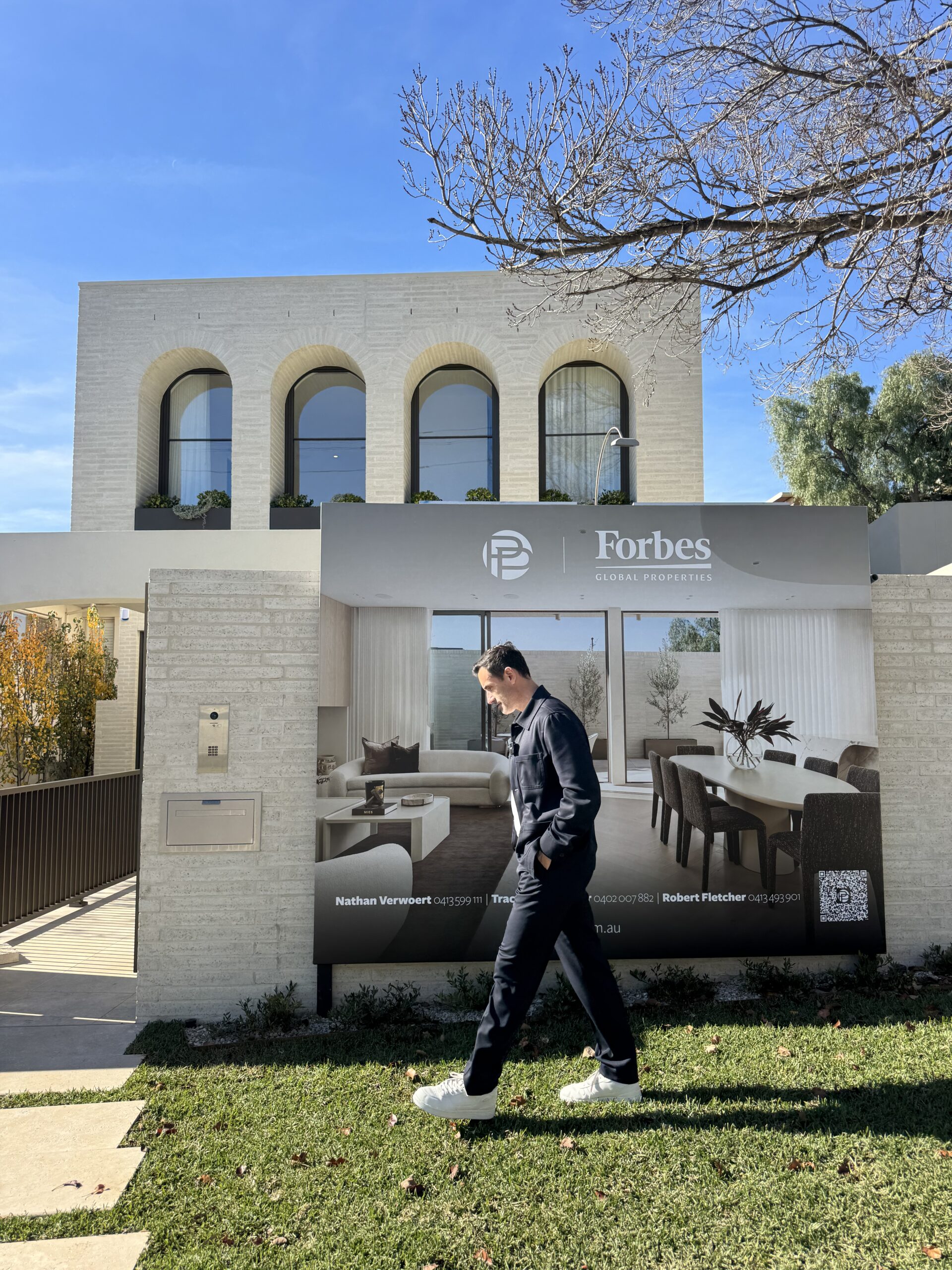 Buyer Agent, Andrew Date, in front of a Toorak house for sale.